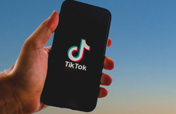 A phone with TikTok logo on the screen.
